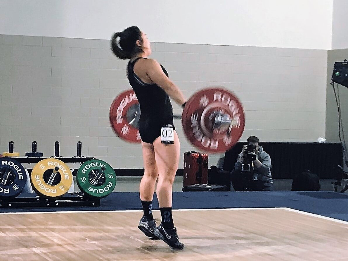 woman lifting weights